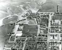 Thumbnail for 'Aerial view of campus looking east, circa 1954'