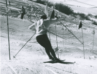 Thumbnail for 'A WSC slalom competitor on the course during Winter Carnival, 1963.'