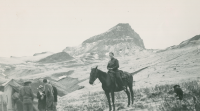 Thumbnail for 'A woman on horseback outside the Hiking and Outing Club tent near Uncompahgre Peak, 1930s.'