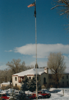 Thumbnail for 'View of the east end of Ute Hall from the northeast, ca. March 1993.  The campus flagpole is in the foreground.'
