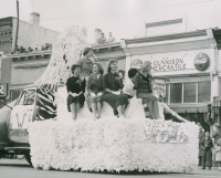 Thumbnail for 'The Homecoming Queen float on Main Street, 1957.'