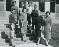 Thumbnail for 'The 1959 WSC Homecoming royalty pose in front of the Student Union.  Queen Clara Darnell is on the far right.'