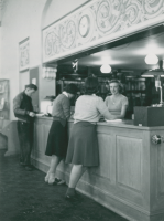 Thumbnail for 'Western students at the circulation desk, Leslie J. Savage Library, circa early 1950s.'