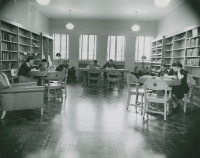 Thumbnail for 'The browsing room (east end) of Leslie J. Savage Library, circa early 1950s.'