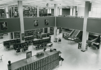 Thumbnail for 'The circulation desk area of Savage Library from the southwest corner of the second floor mezzanine, circa 1980s.'