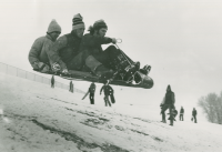 Thumbnail for 'Three WSC students catch some air on their toboggan on their way down the west side of Mountaineer Bowl'