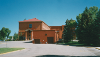 Thumbnail for 'The south end of Taylor Hall and the garage / storage  / original power plant building, ca. 2000.'
