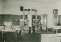 Thumbnail for 'Twin coal stoves in the Domestic Science room, Normal Hall, circa 1913.'