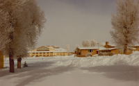 Thumbnail for 'View of Mountaineer Gymnasium and the Student Union from the south on a winter day, early 1960s.'