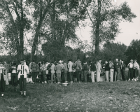 Thumbnail for 'Western students line up at a picnic along the Gunnison River, circa early 1950s.'