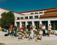 Thumbnail for 'A casually-dressed WSC Jazz Band performs on the south side of Keating Hall, ca. 1990.  Keating Hall was renovated in 1989; this...'