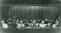 Thumbnail for 'Members of the 1935 WSC orchestra pose for a photograph in Taylor Auditorium.'