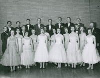 Thumbnail for 'A WSC mixed chorus in formal attire perform in the WSC Student Union Ballroom, ca. 1959.'