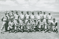 Thumbnail for 'The 1960 Baseball Team poses for a photograph on the practice field north of Mountaineer Gymnasium.'