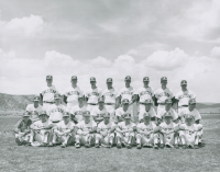 Thumbnail for 'A late-1960s WSC baseball team poses for a photograph on the practice fields north of Mountaineer Gymnasium.  Possibly 1969,...'