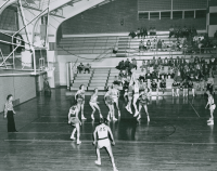 Thumbnail for 'The Mountaineer basketball team are in action against Regis College at home, ca. 1956.'